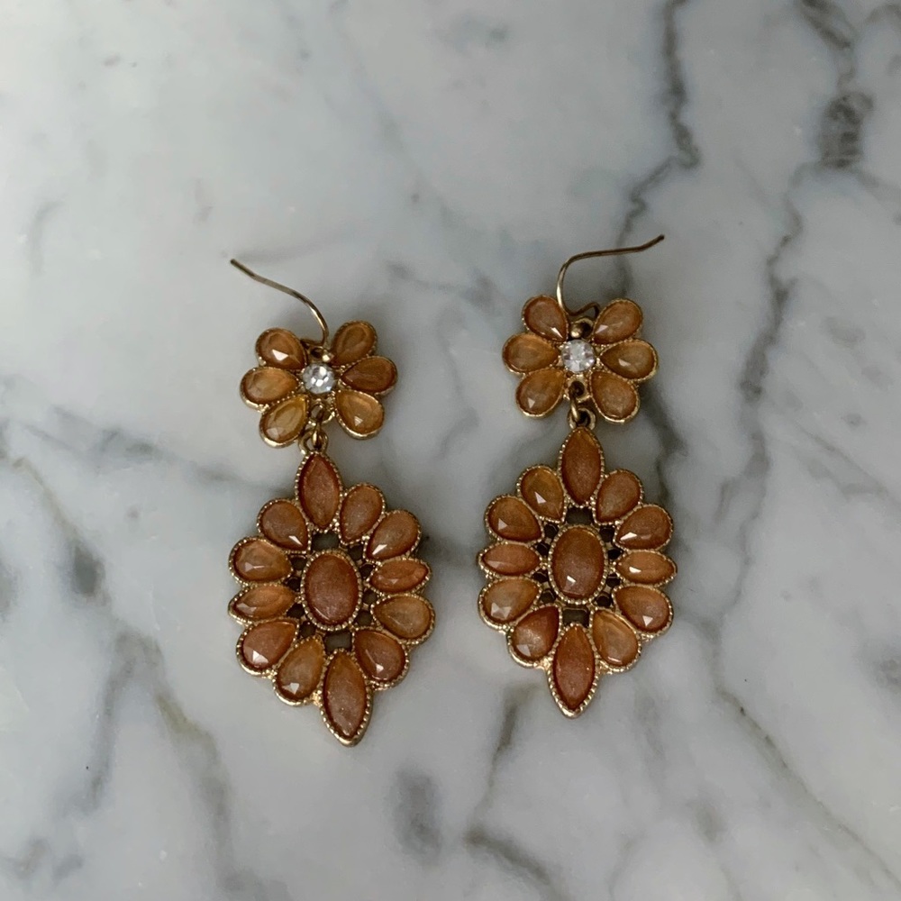 Peachy floral earrings with gold backing.